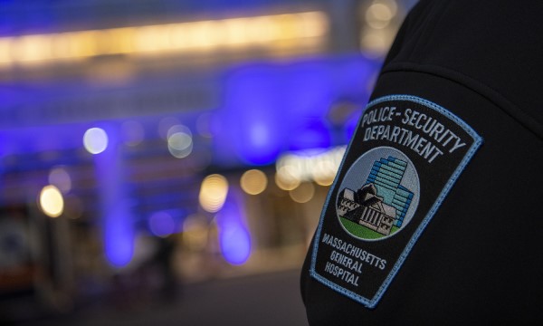 Closeup of security officer's arm showing the Mass General Police & Security patch. Closeup of security officer's arm showing the Mass General Police & Security patch.