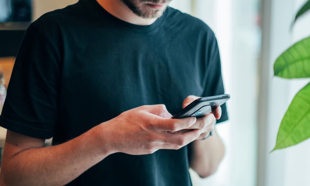 close up of someone using their phone close up of someone using their phone