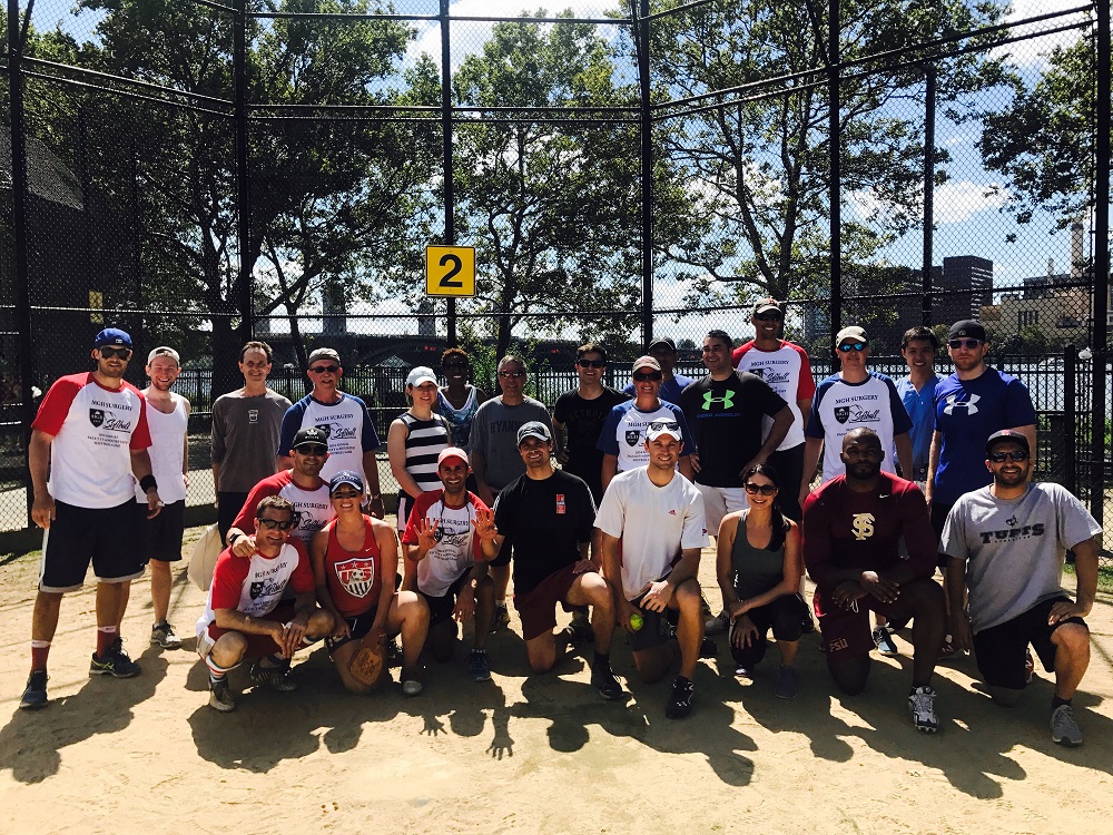 Residents enjoy a resident vs. faculty softball game.