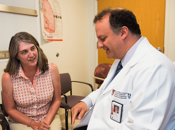 Dr. Lanuti with a patient Dr. Lanuti with a patient
