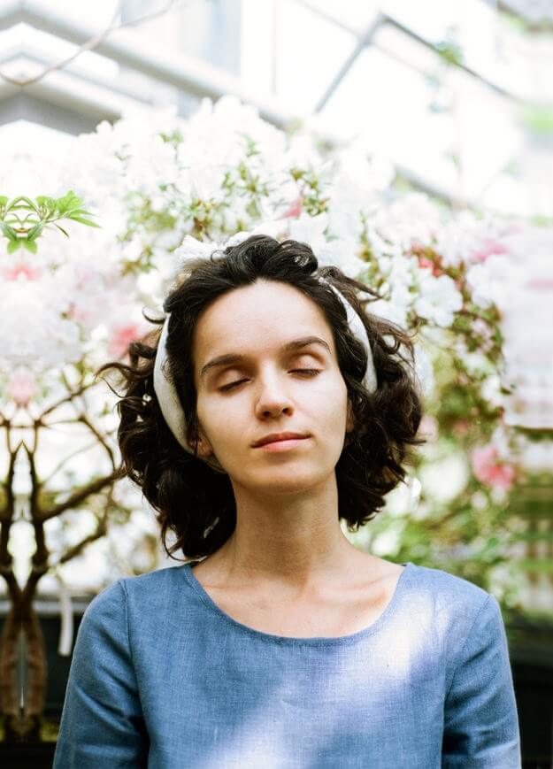 A woman with her eyes closed